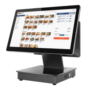 Front-angle view of the dual-screen XB-S82 POS cash register featuring a large primary operator touchscreen and an integrated customer-facing secondary display.