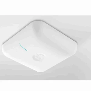The low-profile Cambium cnPilot e410 indoor Wi-Fi 5 access point installed in a university classroom hallway to provide high-density student connectivity.