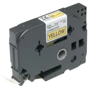 Close-up view of the TZ2-631 cartridge output guide channel highlighting the pre-aligned 12mm yellow laminated media strip and protective overlay.