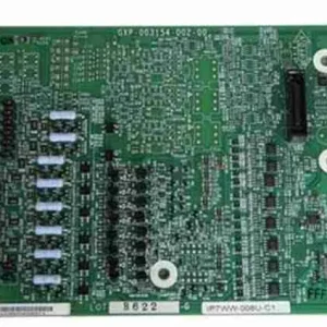 Close-up of the NEC IP7WW-008U-C1 PCB showing the electronic capacitors, resistors, and expansion interface contacts.