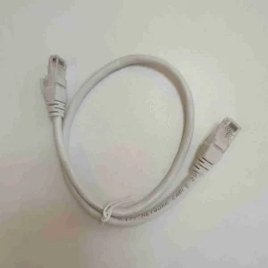 NEXA 0.5-meter copper Cat6 UTP patch cord in a clean network rack setup connecting high-speed switches and patch panels.
