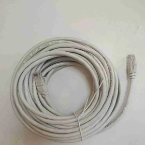 NEXA 10-meter grey copper Cat6 UTP patch cord neatly routed across data center racks to bridge connections over extended distances.